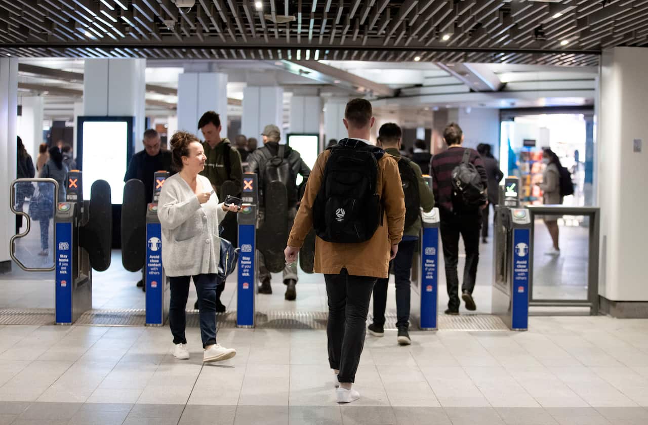 Commuters at a Sydney train station
