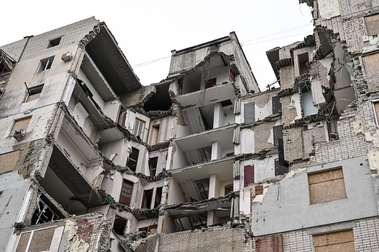 A residential apartment building is destroyed by a drone attack.