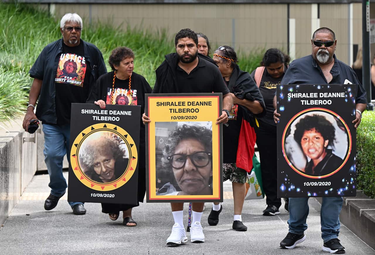 The family and friends of Shiralee Tilberoo, who died in the Brisbane Watch House in September 2020 are seen arriving at the Brisbane Coroners Court, in Brisbane, Wednesday, March 8, 2023. The Coroners Court is holding a joint inquest for two Indigenous women who died in custody. 