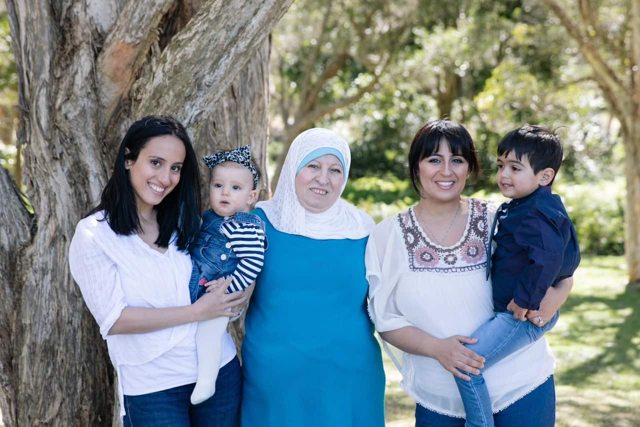 Fatma Qweder with grand daughters.JPG