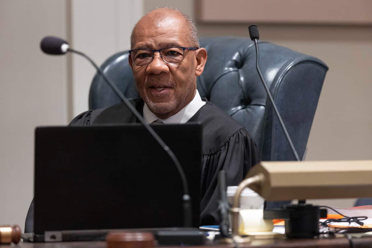 An African American judge sits in court