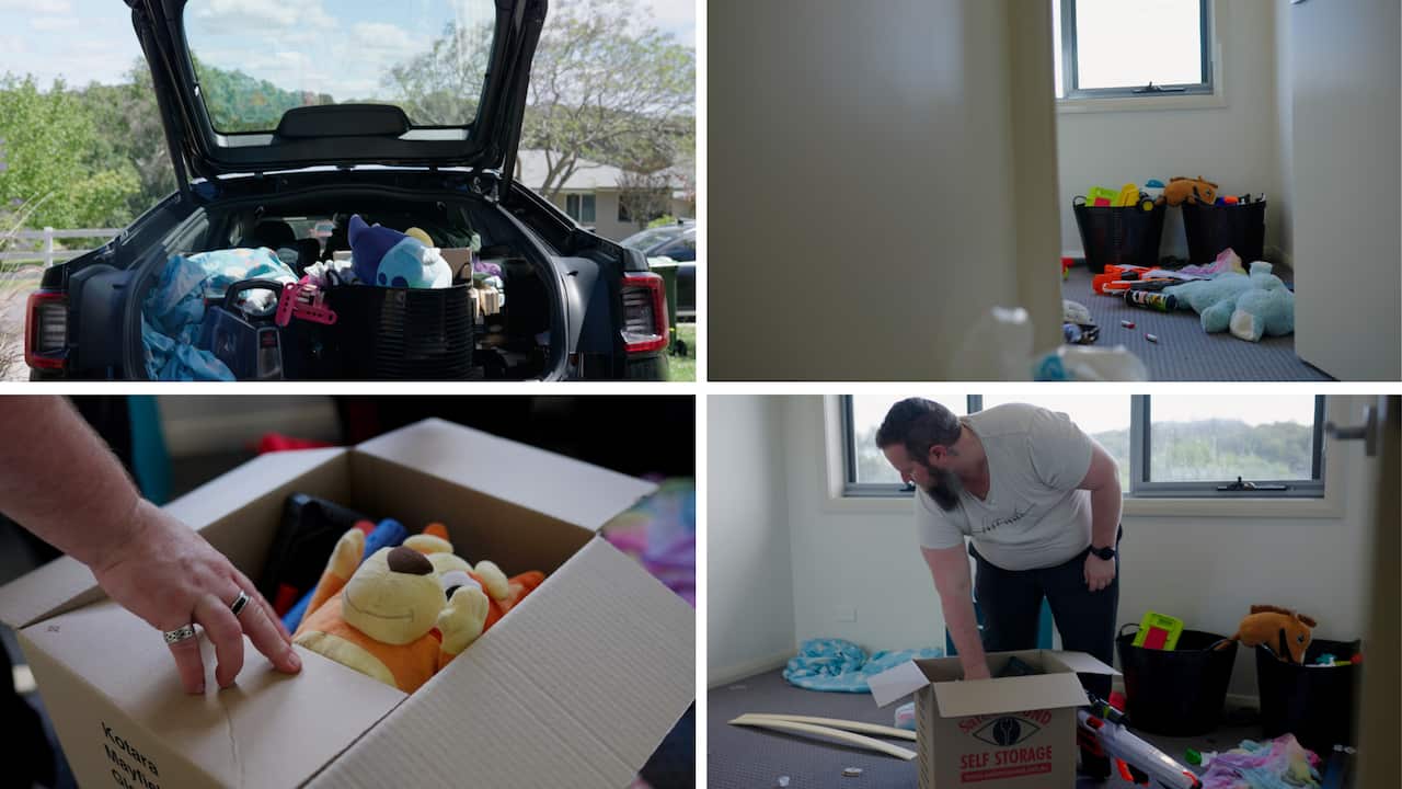 A man packing up toys into a car.
