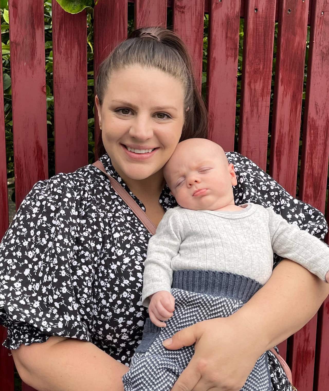 Ms Arnott-Goddard was able to take her son with her to work at a childcare centre.