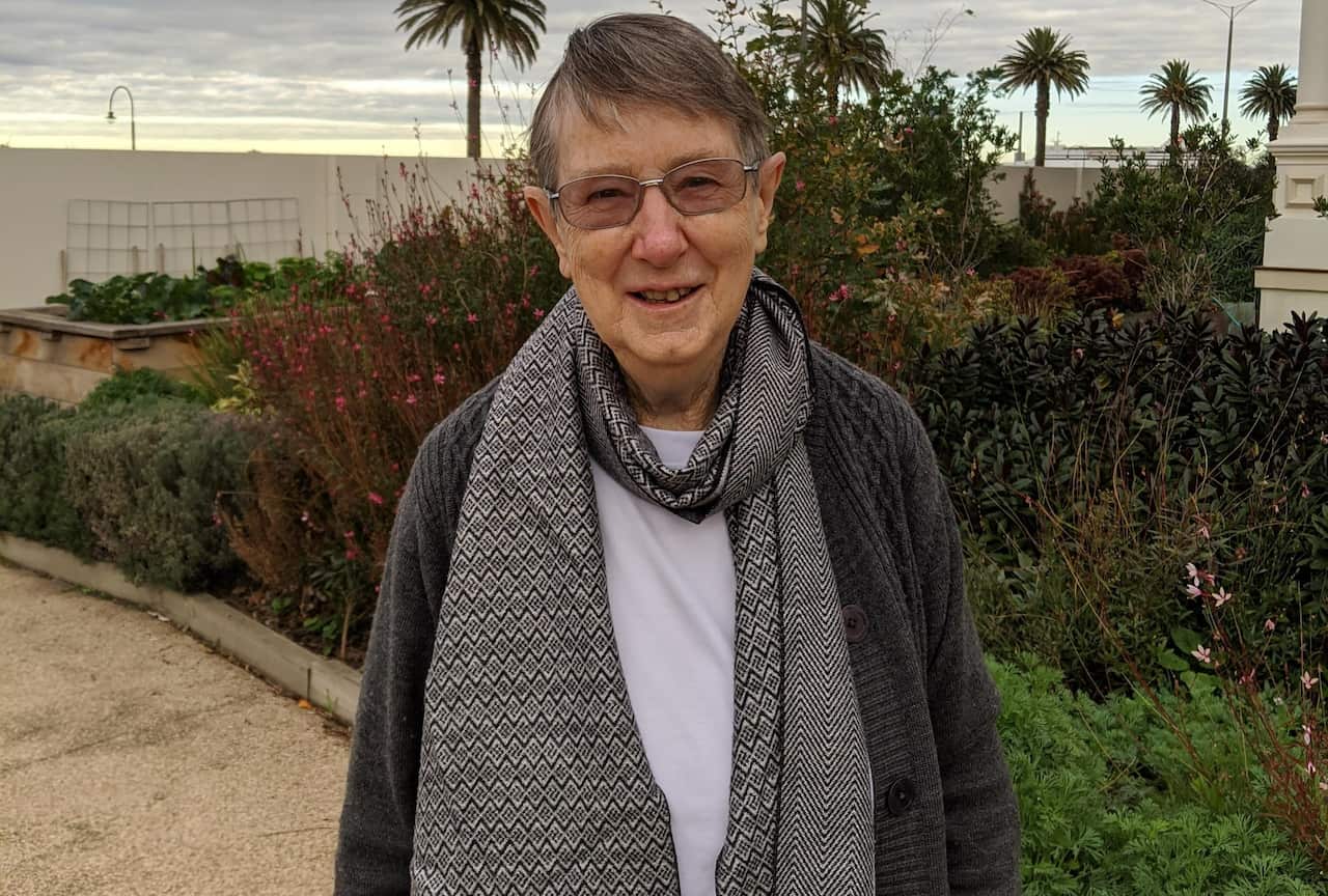 Brigid Arthur smiling at the camera.