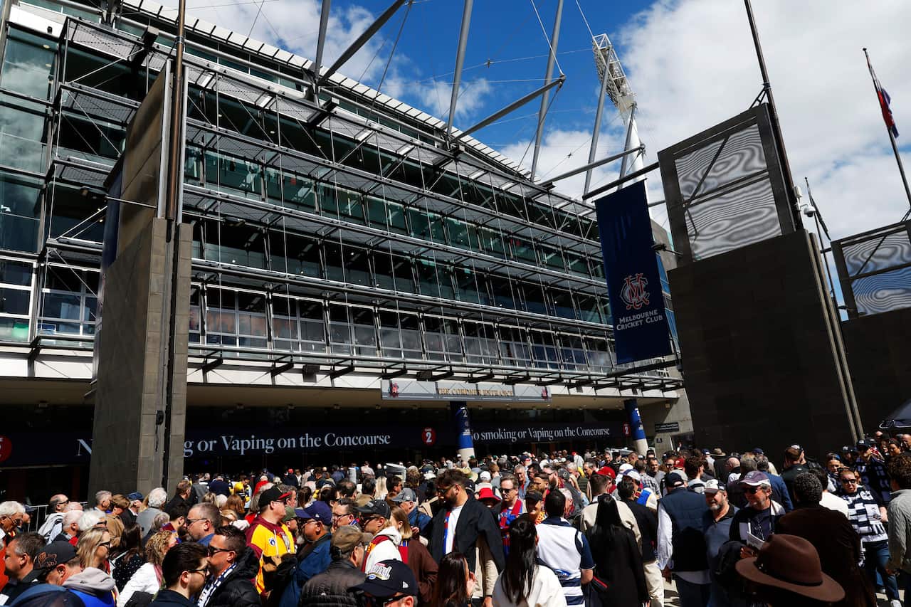 People outside the Melbourne Cricket Ground