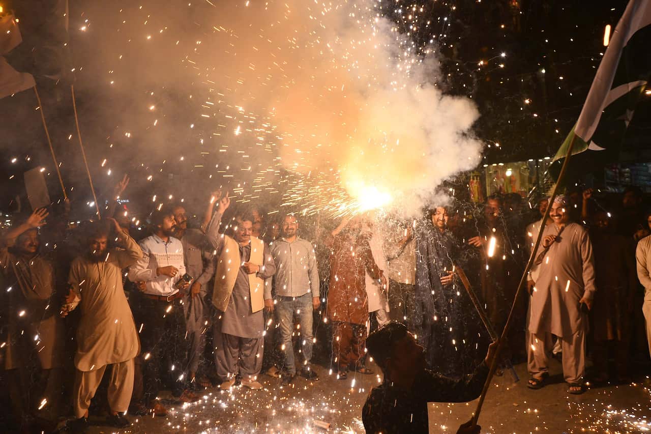 A large group of people celebrating.