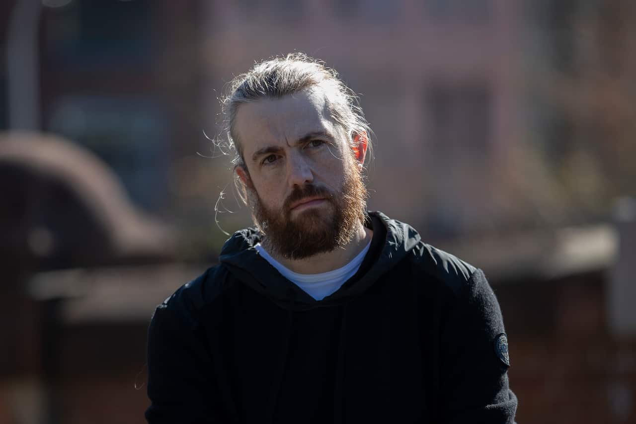 Mike Cannon-Brookes poses for a photo