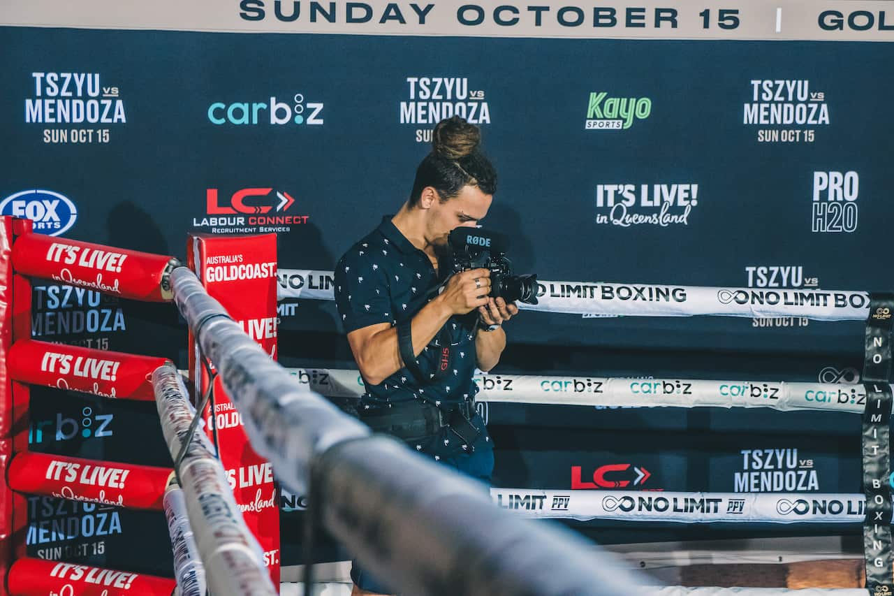 Graal Lucignano filming an event in Queensland last October.