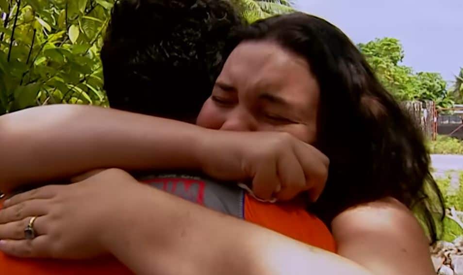 A man and woman hugging