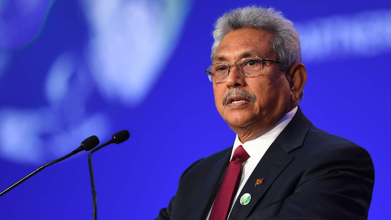 A man speaking into a microphone.