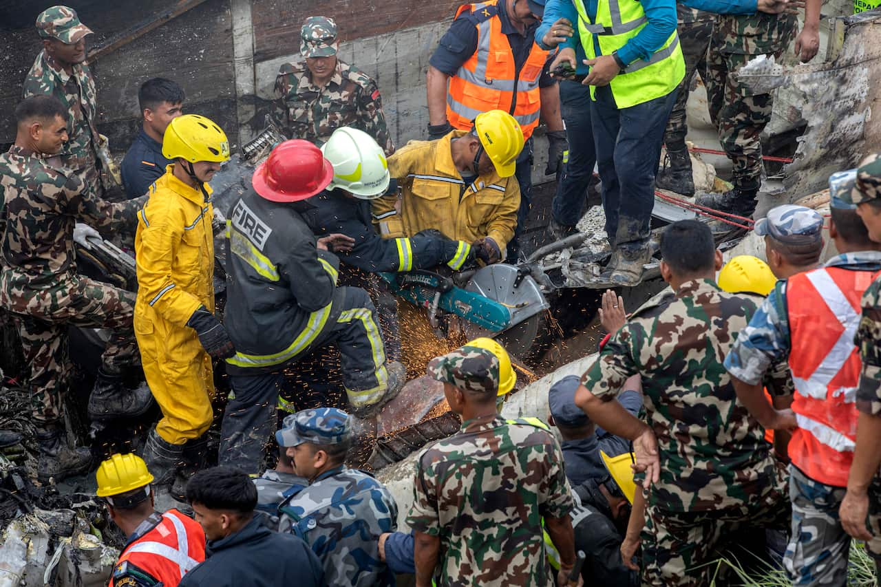 Rescue operations at the Saurya Airlines plane crash site on Wednesday, 24 July 2024.