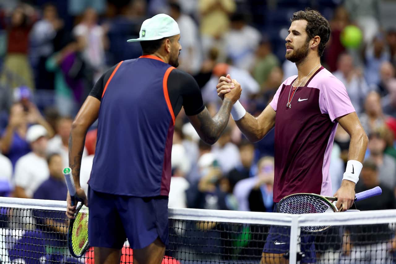 Karen Khachanov (right) shakes hands with Nick Kyrgios after their men’s singles quarterfinal match at the 2022 US Open.