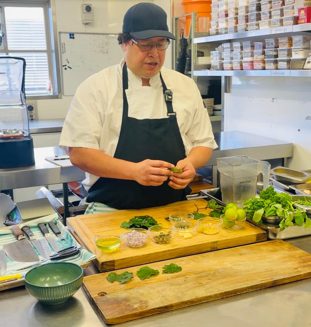 Chef Harry Tahana at Black & Gold powered by Wellington Functions cooking with kawakawa.jpeg