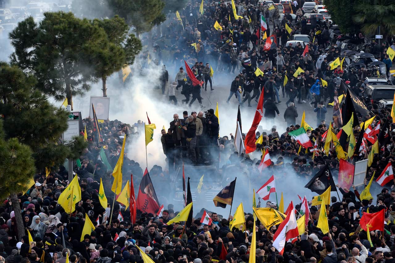 Hezbollah supporters protest at the entrance to Rafic Hariri International Airport