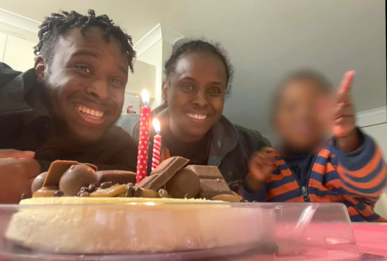 Naima Ibrahim (centre) with her sons  Jermal (left)  and Ousmane (right)