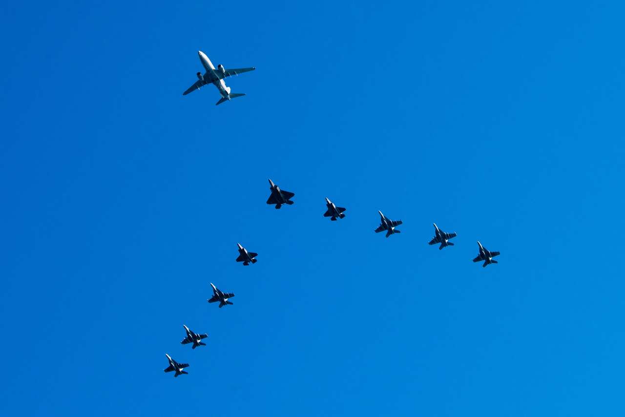 Fighter planes flying in formation