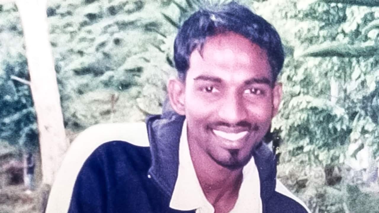 A photo of a smiling man