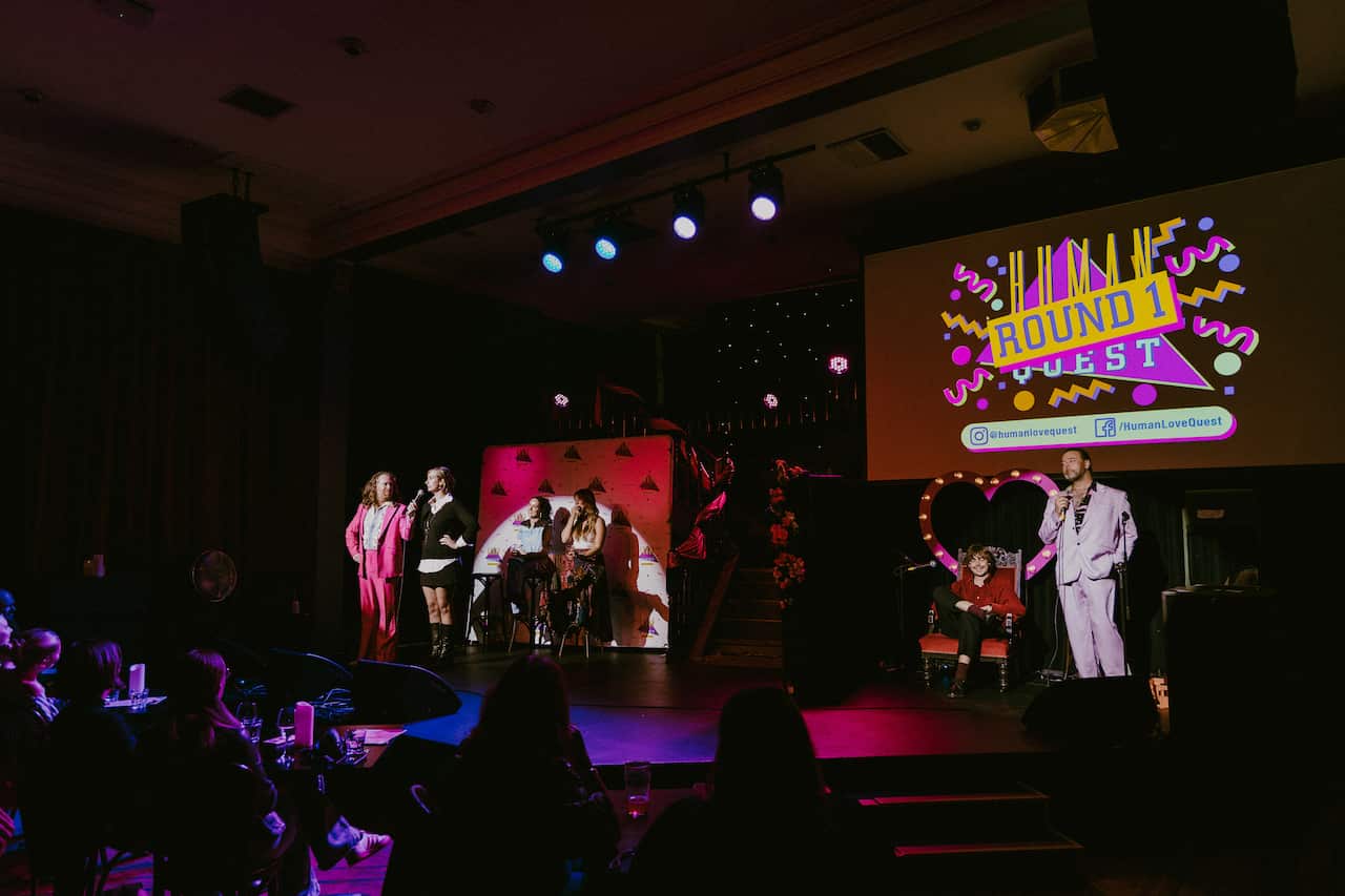 On-stage at a live dating show.
