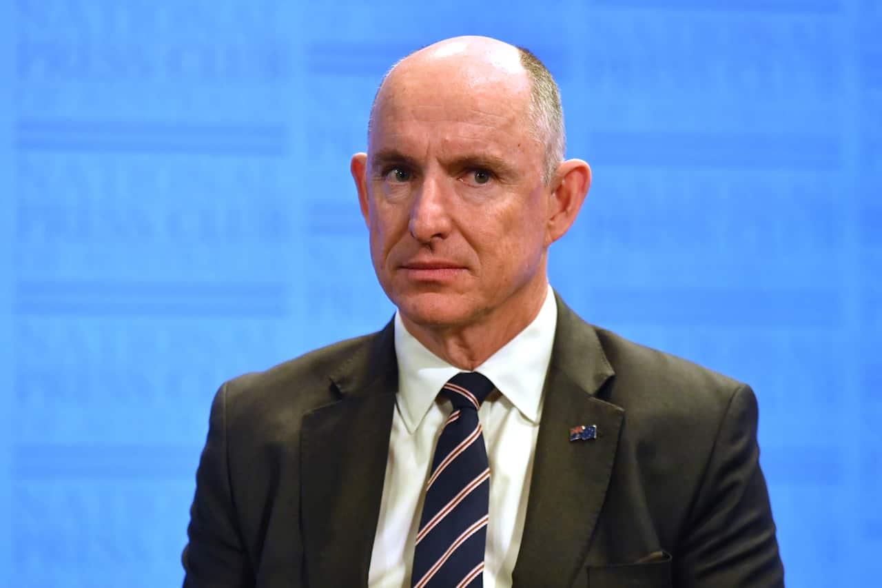 Stuart Robert in a suit and tie