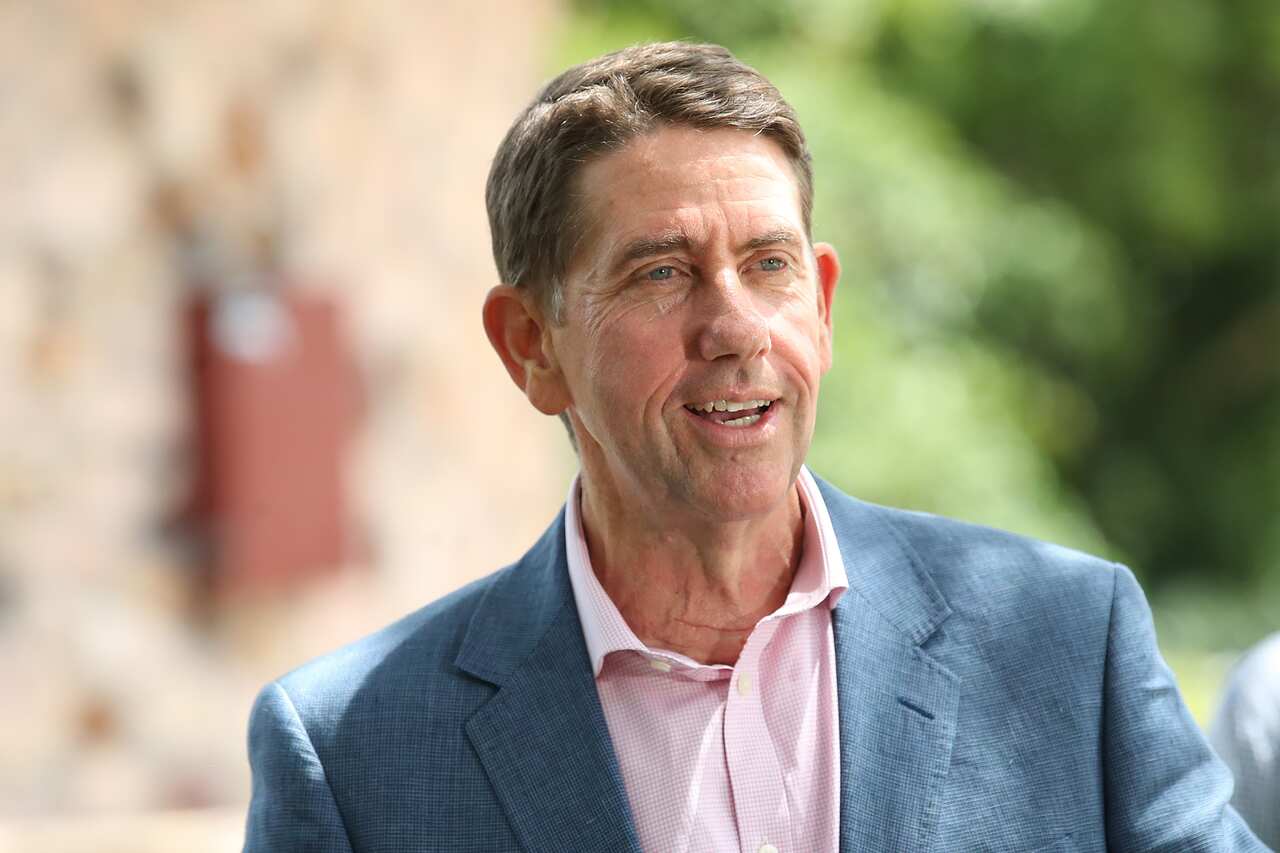 Queensland Treasurer and Acting Premier Cameron Dick is seen speaking.