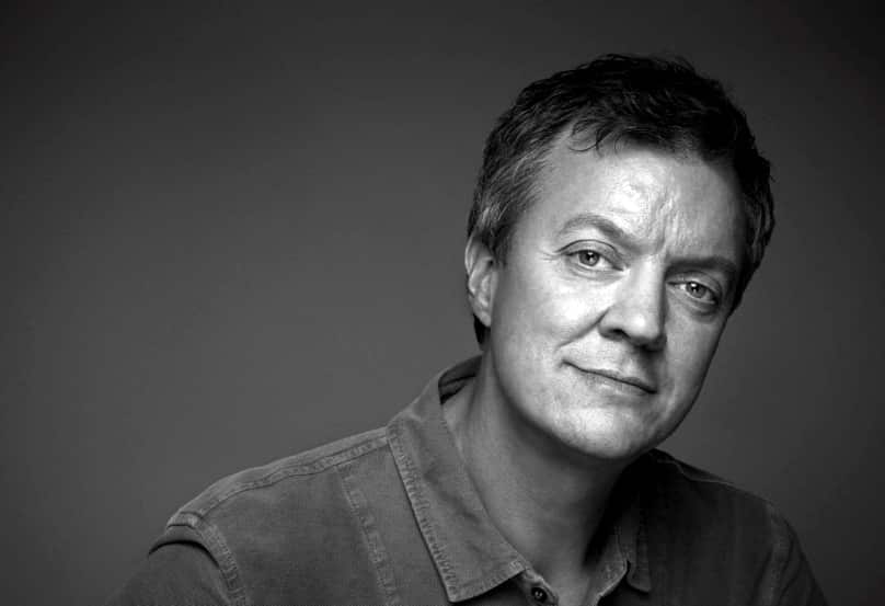 Swedish director Johan Brisinger smiles for the camera.jpg