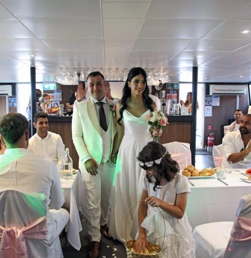 A husband and wife on their wedding day.