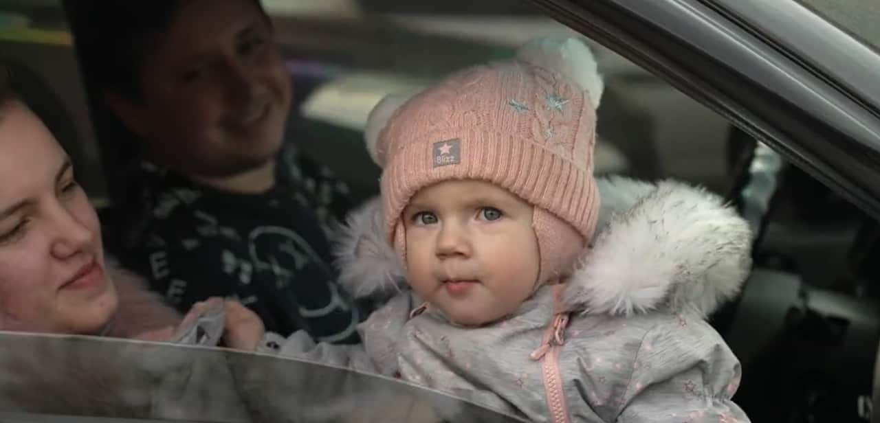 Artem is in the car dropping off his wife and child to Poland before he will return and defend Ukraine as a conscript.