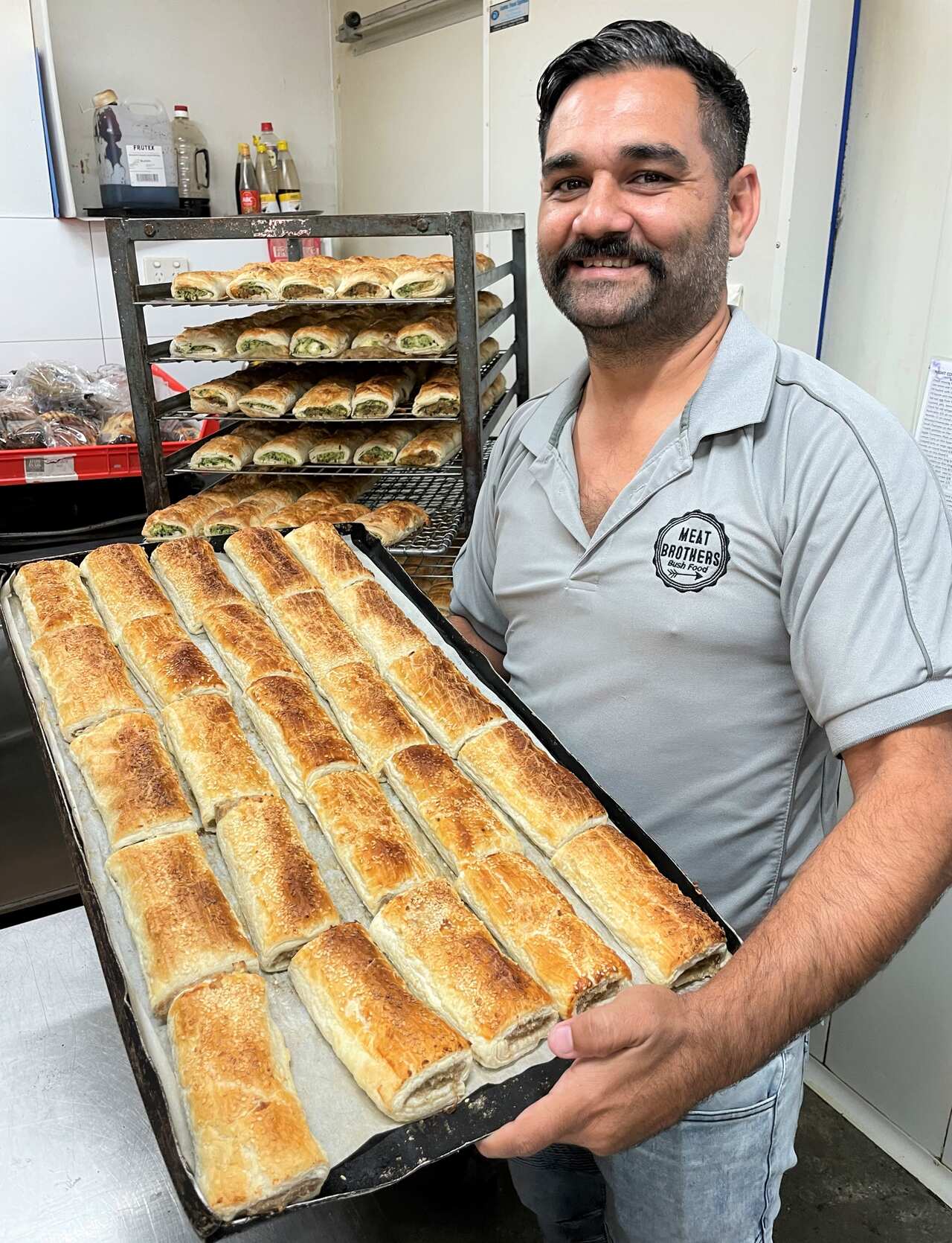 Corey with lemon myrtle and chicken rolls 