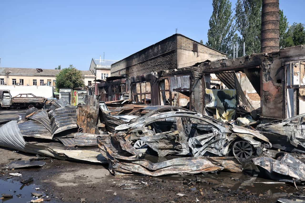 Buildings and cars burnt and destroyed