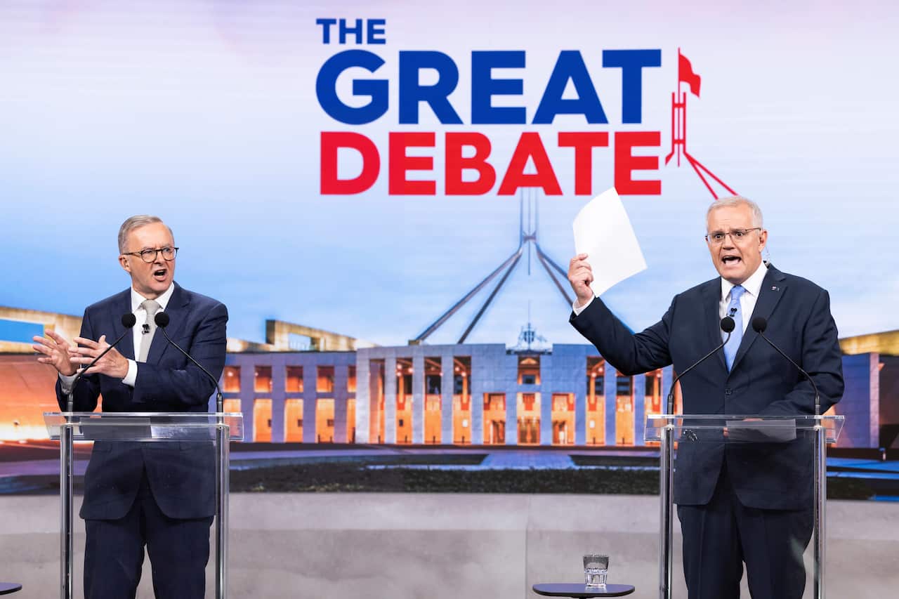 Australian Prime Minister Scott Morrison (right) and Opposition leader Anthony Albanese during the second leaders' debate ahead of the federal election at Nine Studios in Sydney on 8 May 2022. 