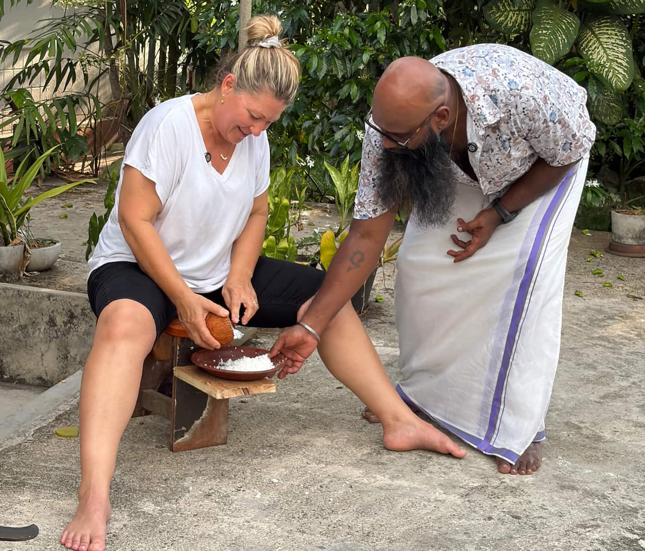 Learning how to grate coconut for Pol Sambol.jpeg