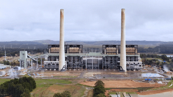 A GIF shows the demolition of Liddell's twin smoke stacks