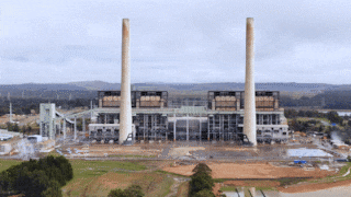 A GIF shows the demolition of Liddell's twin smoke stacks