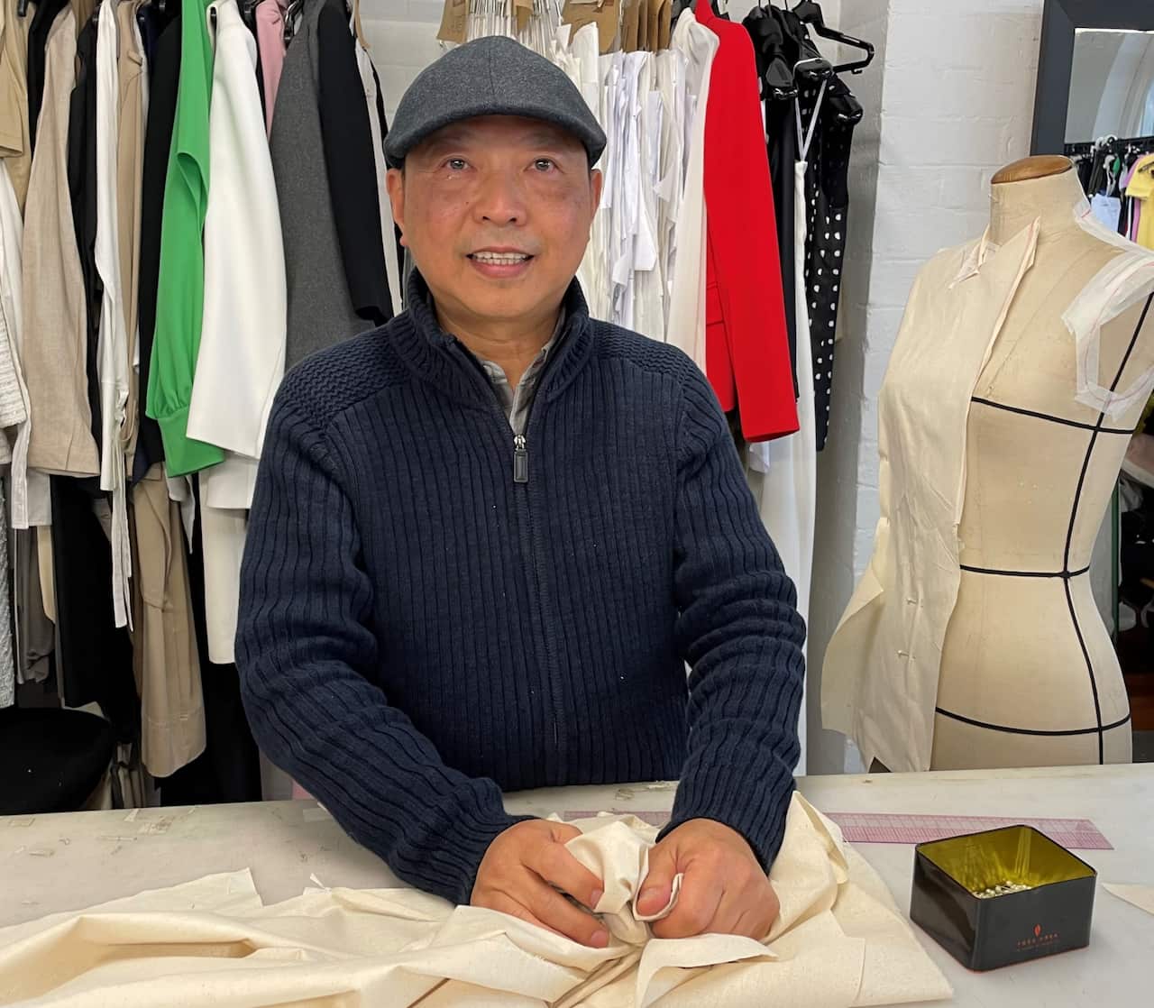 Chief pattern maker Trung Nam Do standing at Carla Zampatti in Sydney.