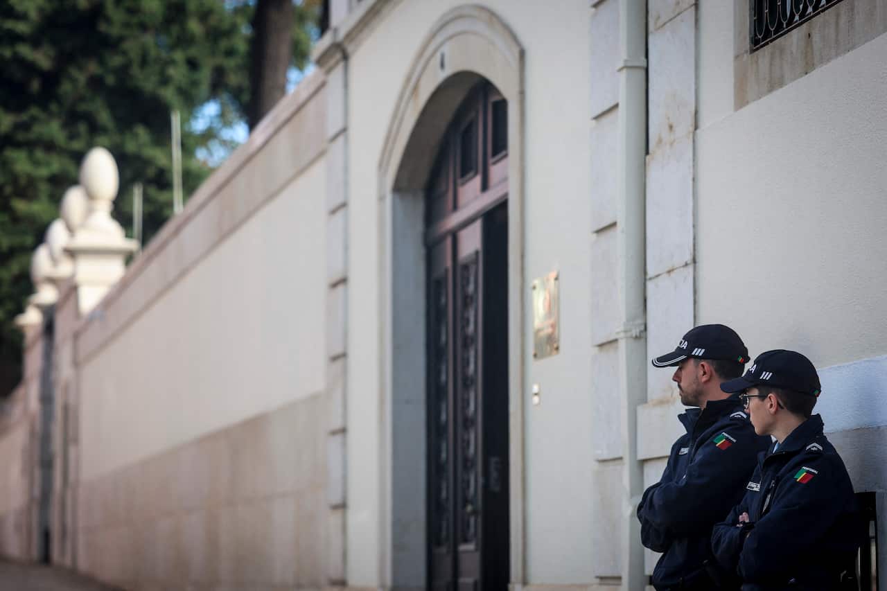 Police officers standing guard outside Portuguese Prime Minister's residence