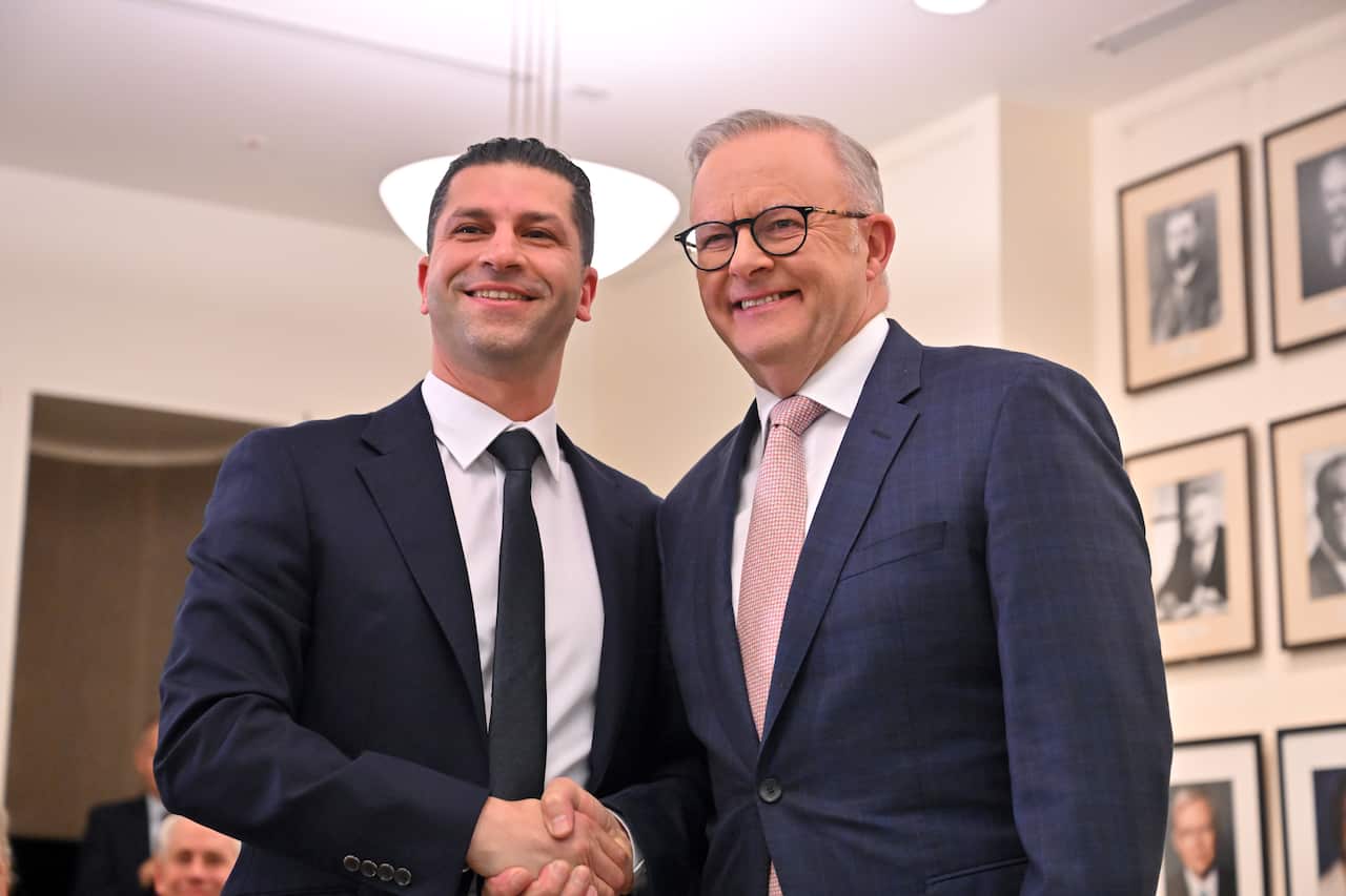 Labor member for Calwell Basem Abdo and Prime Minister Anthony Albanese shake hands 
