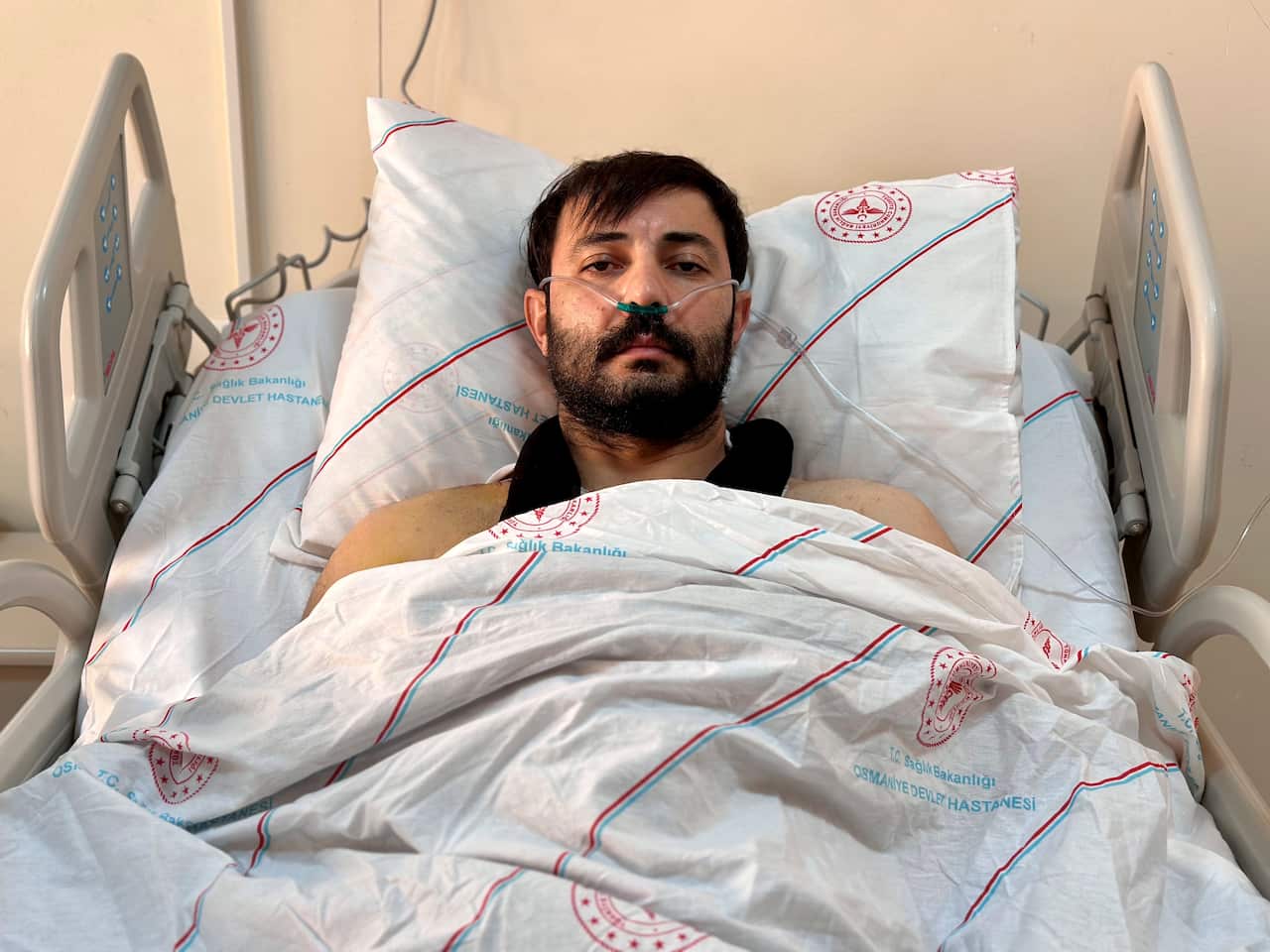 A man in a hospital bed
