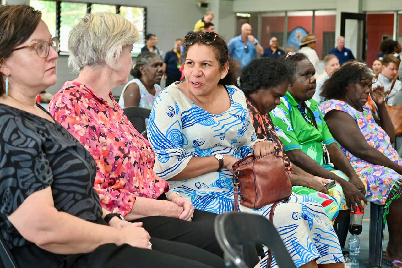 Stakeholders and locals gather in the Angurugu basketball courts to celebrate the new Community Justice Groups, Community Court rounds and the rehabilitation facility on country