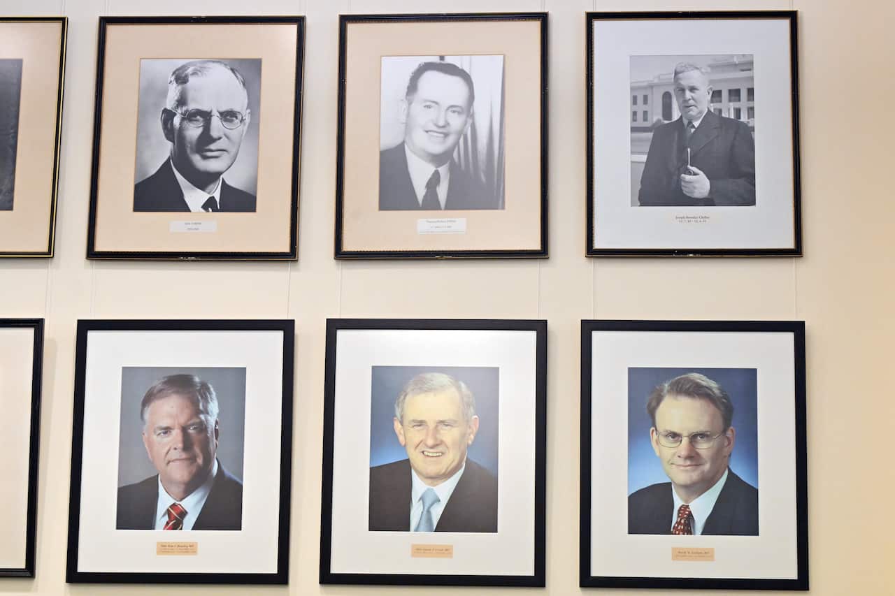 Portraits of former federal Labor leaders John Curtin, Frank Forde, Ben Chifley, Kim Beazley, Simon Crean and Mark Latham in the Labor caucus room.