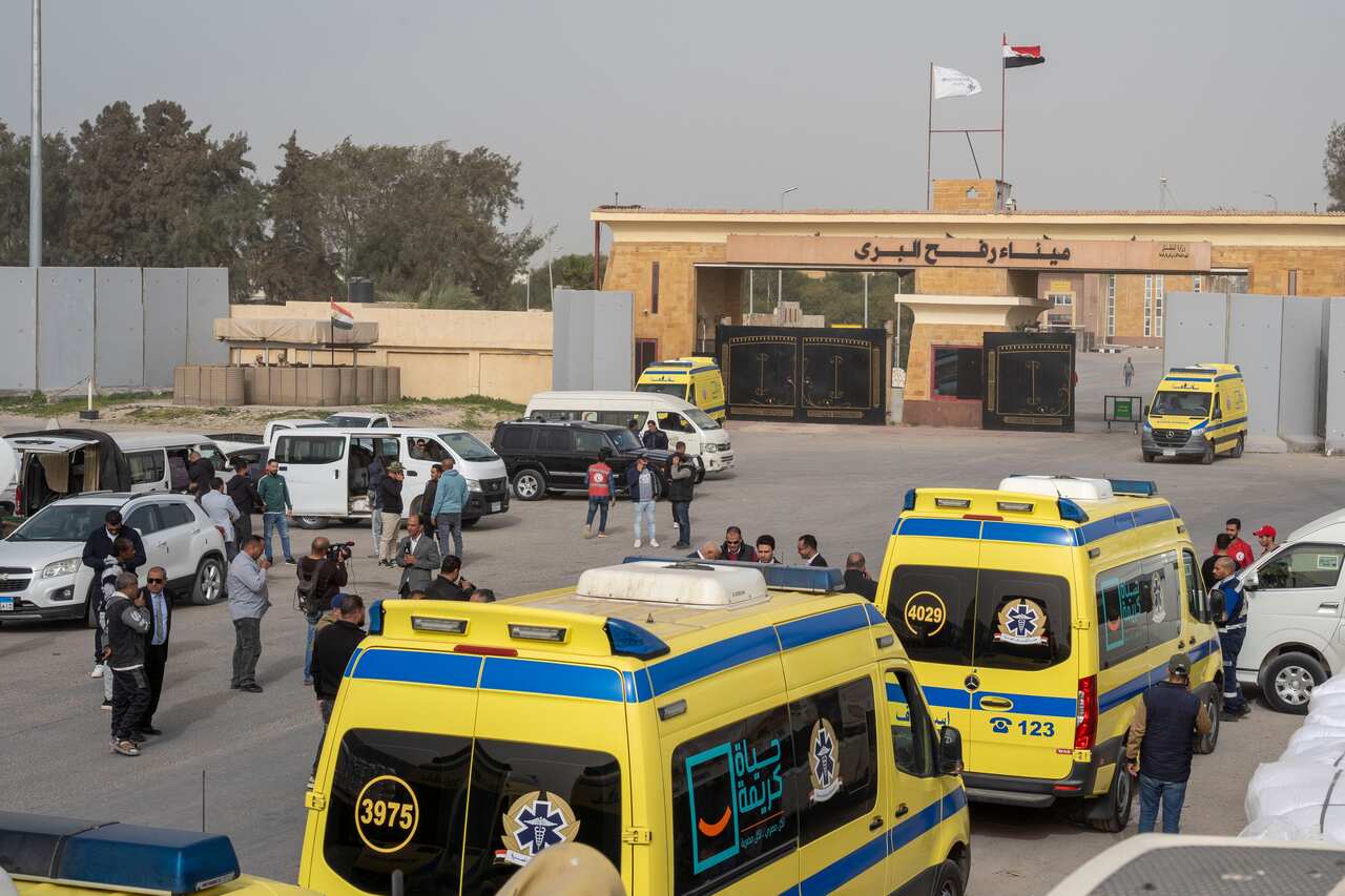Ambulances lined up at a border crossing.
