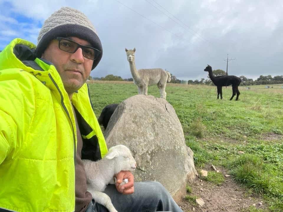 Dr Hamoudi with animals in farm.jpg