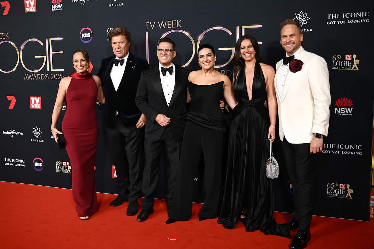 The cast of the Today show on a red carpet at the Logies in formal attire