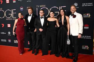 The cast of the Today show on a red carpet at the Logies in formal attire
