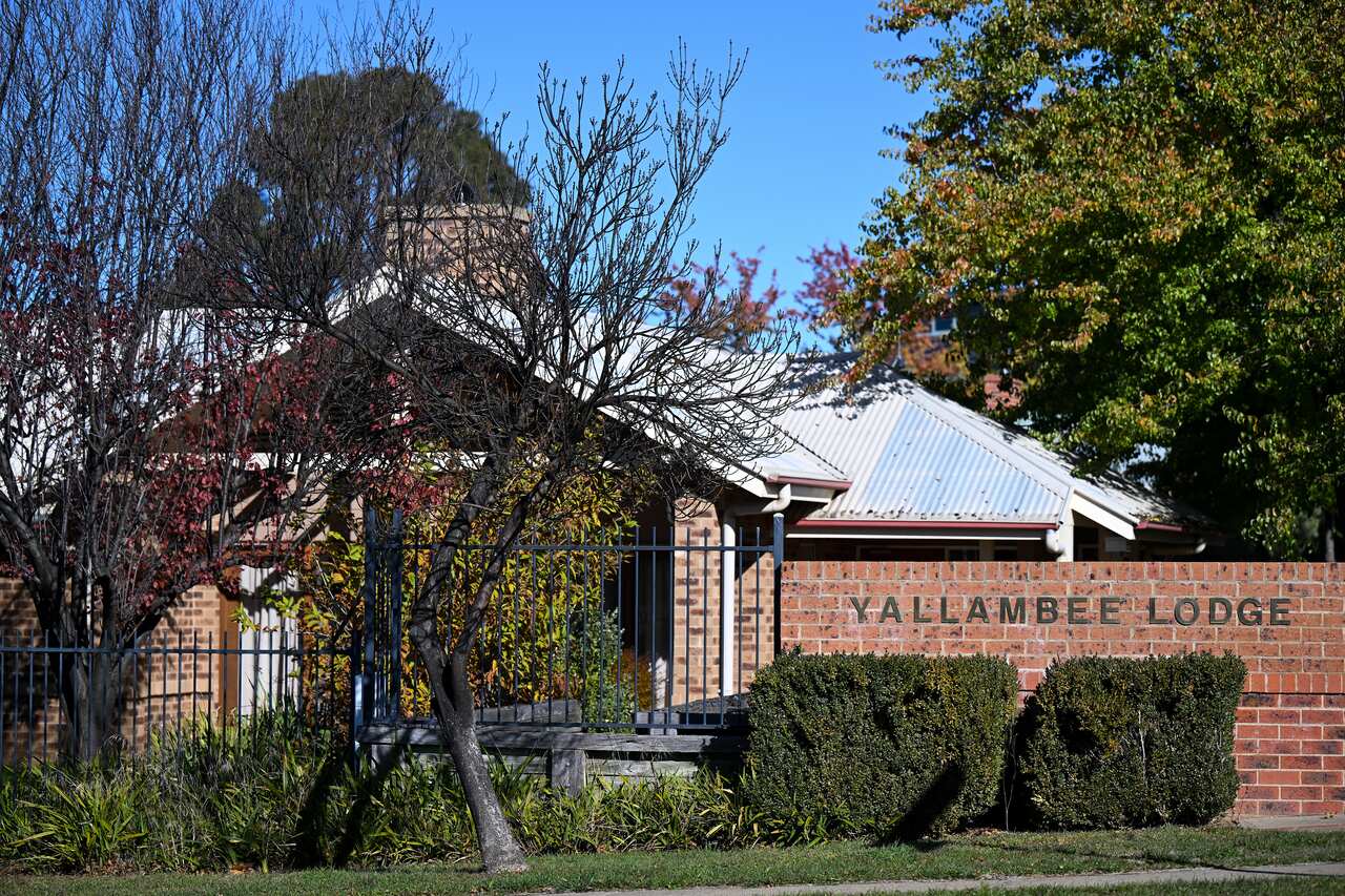 The outside of a building with a Yallambee Lodge sign
