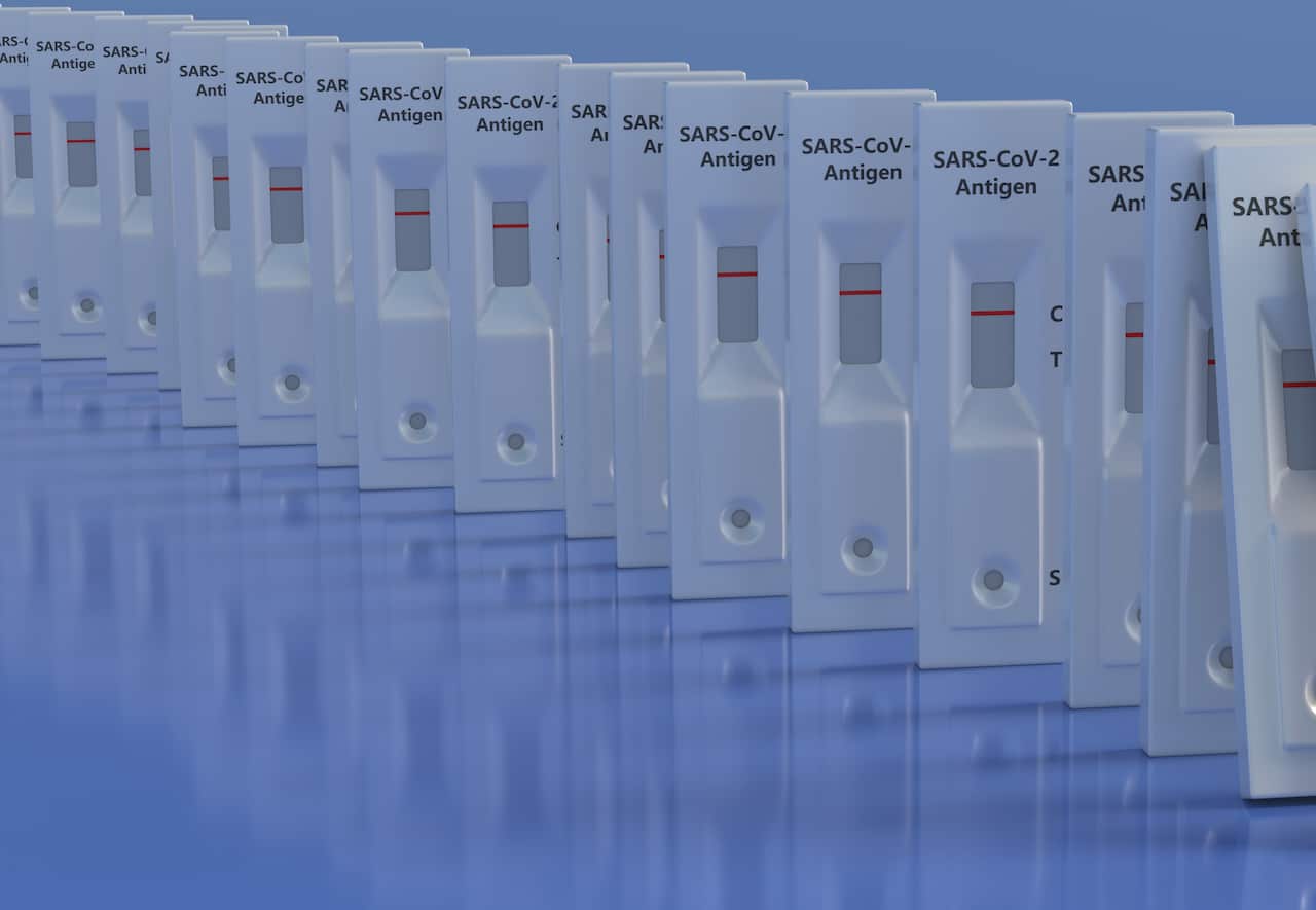 Multiple negative COVID tests lined up like dominos