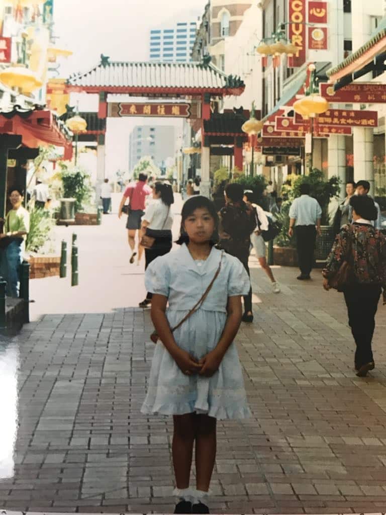 Amina Elshafei as a young girl in Sydney, about to celebrate Eid with her family, by eating a special seafood lunch.