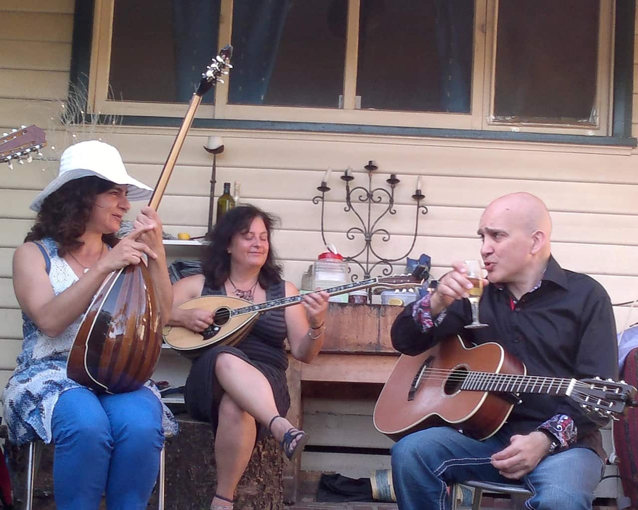 Achilles Yiangoulli photographed here with musicians Christella Demetriou (left) and Irine Vela