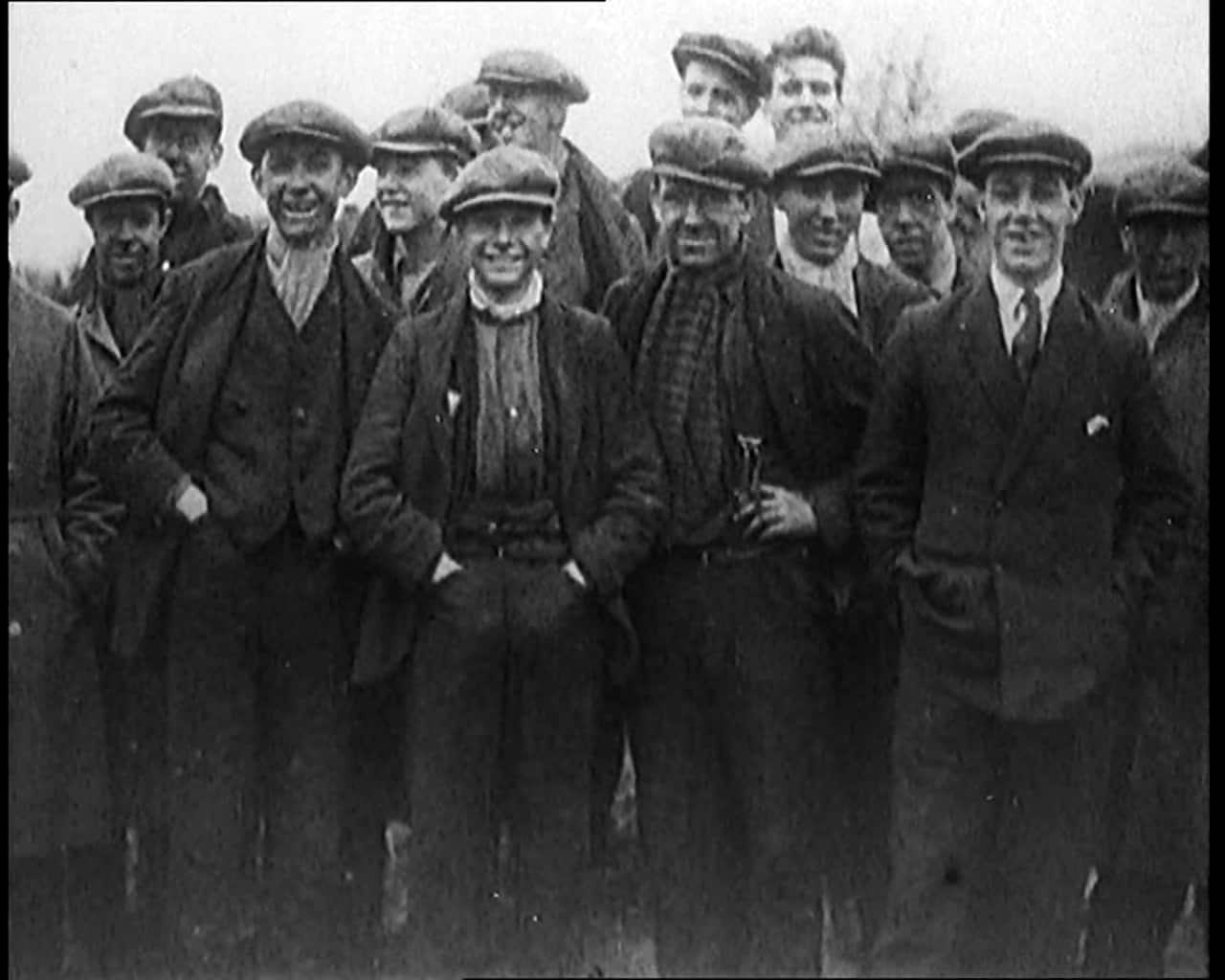 A group of miners posing for the camera.
