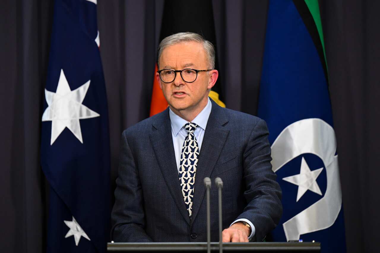 Anthony Albanese speaking from behind a lectern