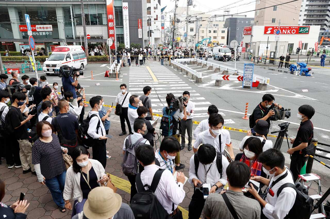 Media crews gather in an area near Kintetsu Railway's Yamato-Saidaiji Station in Nara, after former Prime Minister Shinzo Abe was shot.
